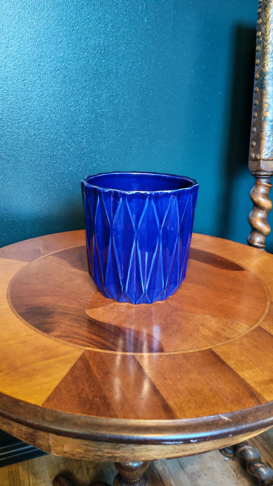 Cobalt blue flowerpot with a geometric pattern