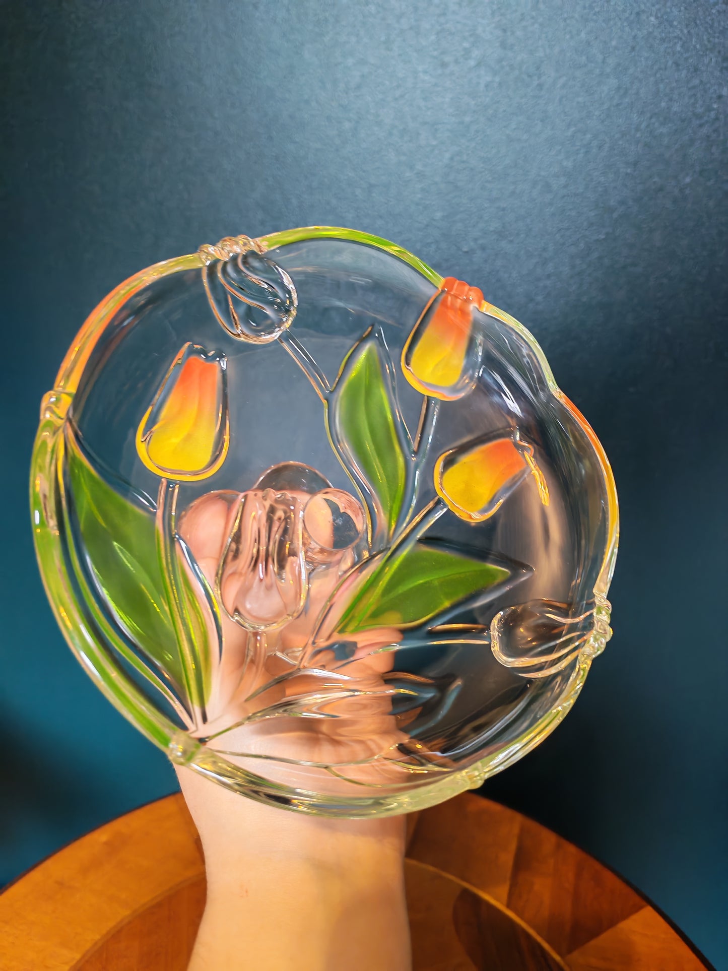 Glass serving platter with a stem and tulip motif