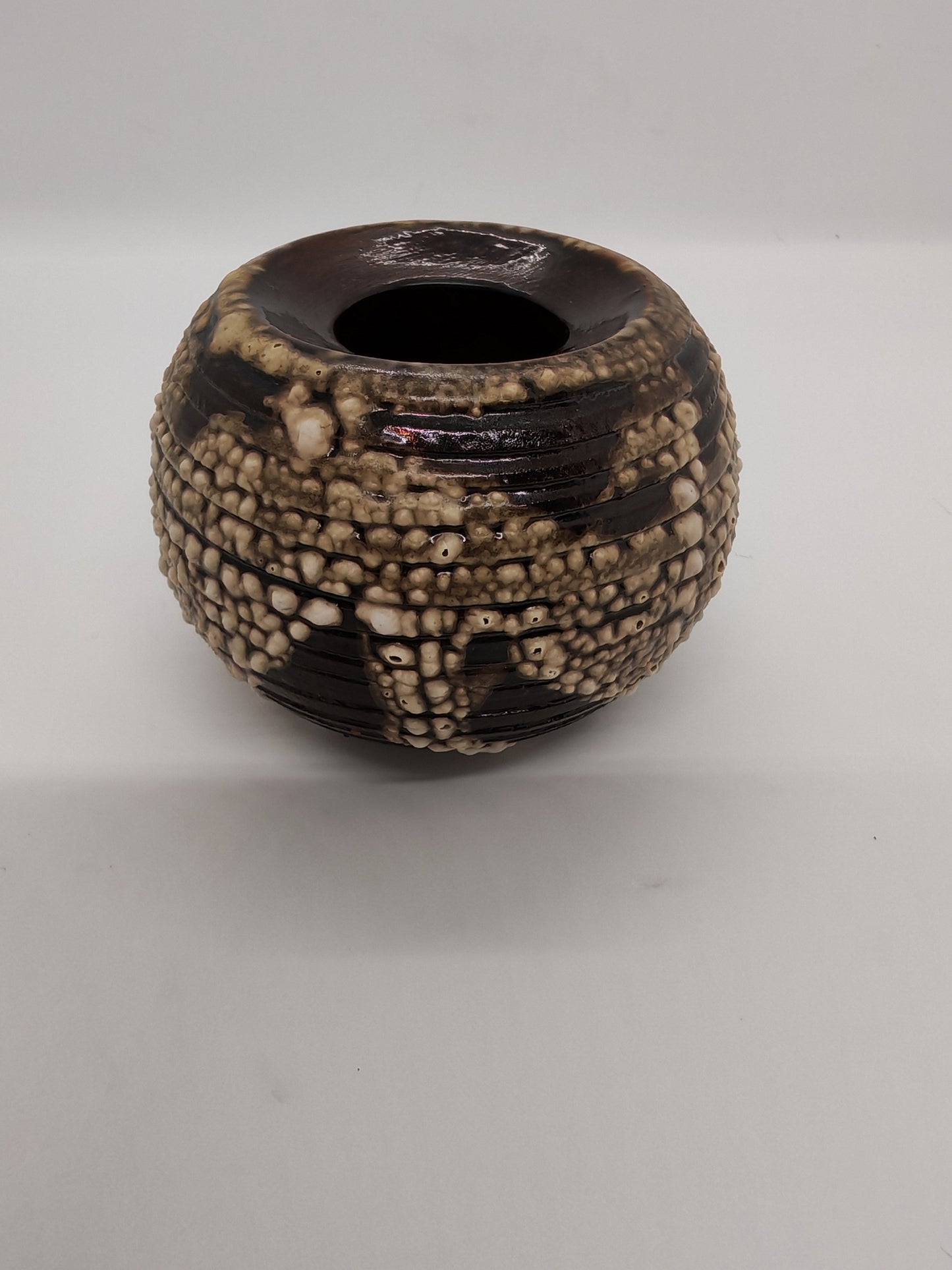 Ceramic spherical small vase