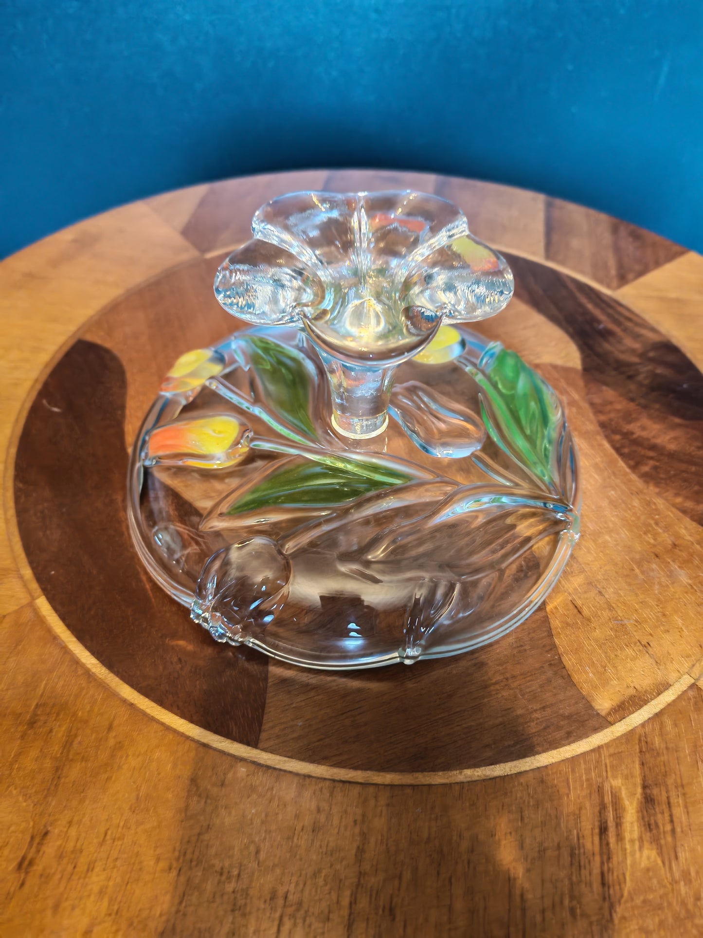 Glass serving platter with a stem and tulip motif