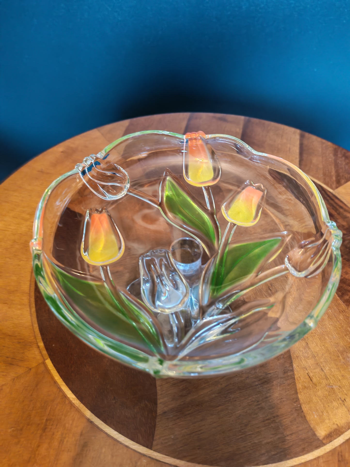 Glass serving platter with a stem and tulip motif