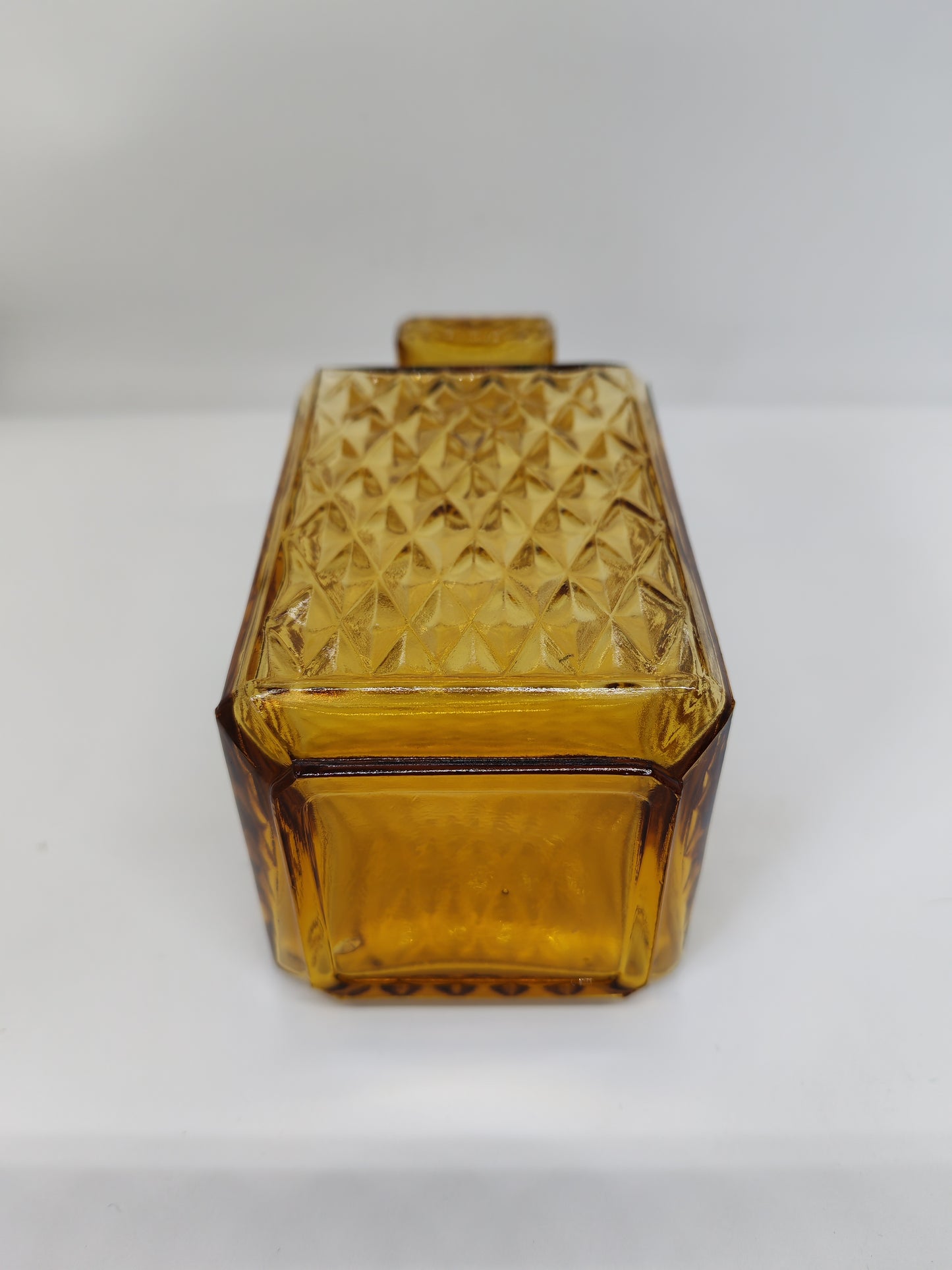 Amber-toned glass carafe