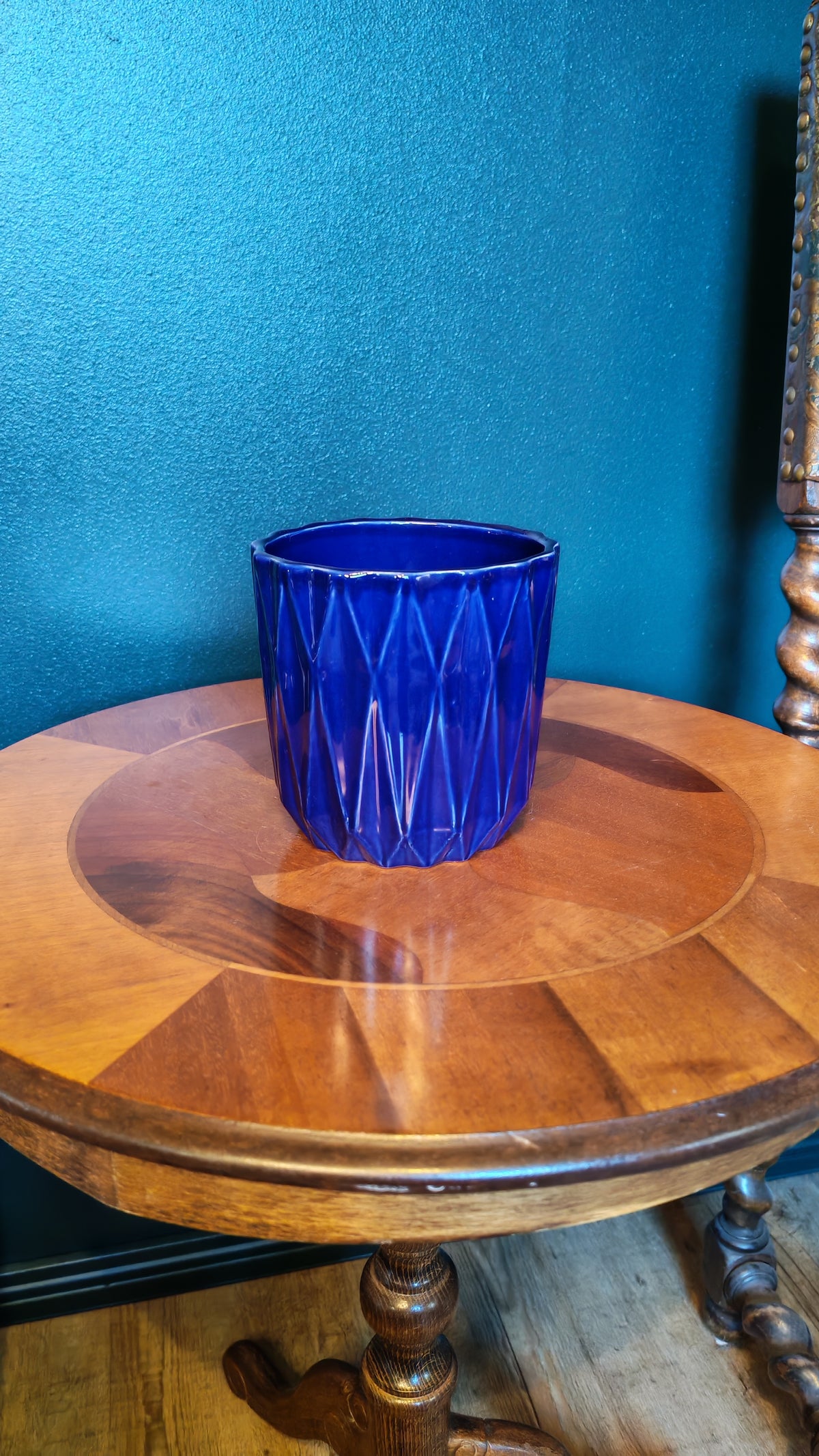 Cobalt blue flowerpot with a geometric pattern